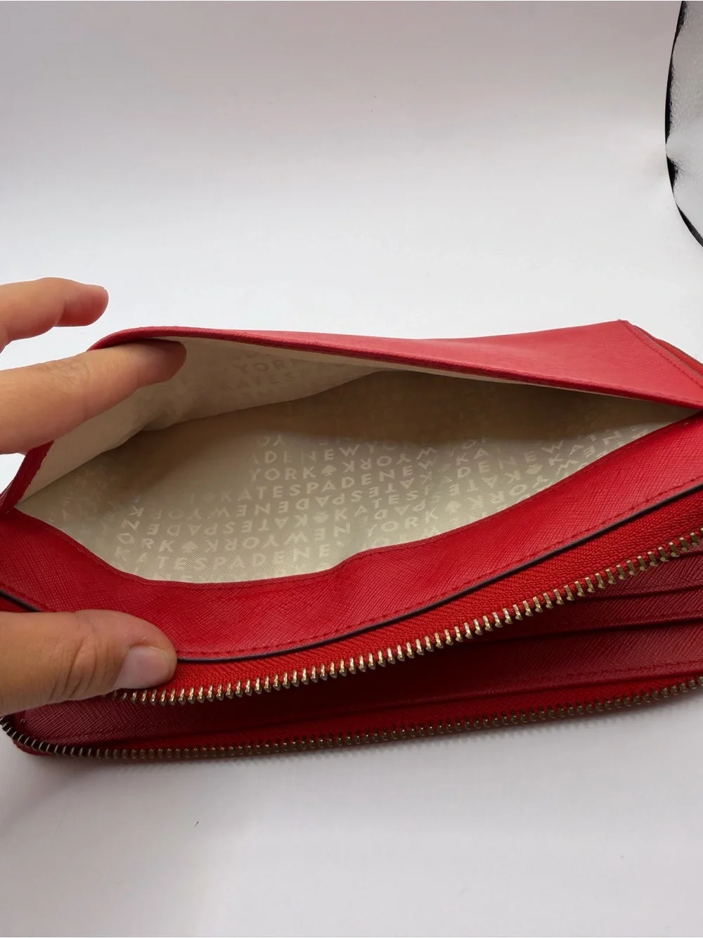 Kate Spade New York red Saffiano leather extra large zipper round wallet